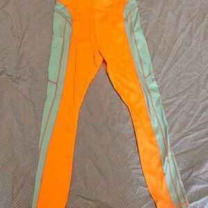 Fabletics Orange and Green Athletic Leggings